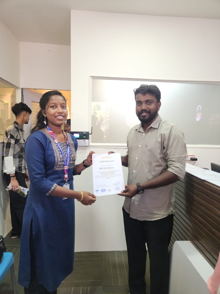 Devananda S receiving certificate at GreatSkill