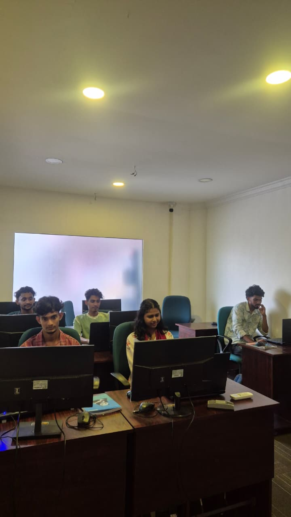 Students attending practical learning class in the IT lab