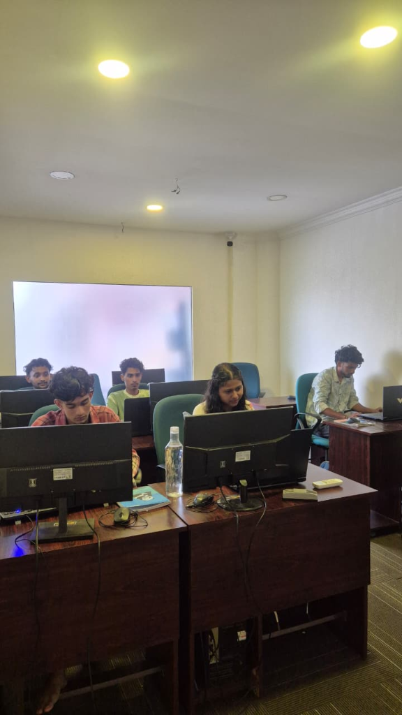 Interactive digital training sessions in progress at the IT lab